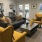 Lenox Park Apts in Houston Clubhouse with Blue Couch and Yellow Chairs